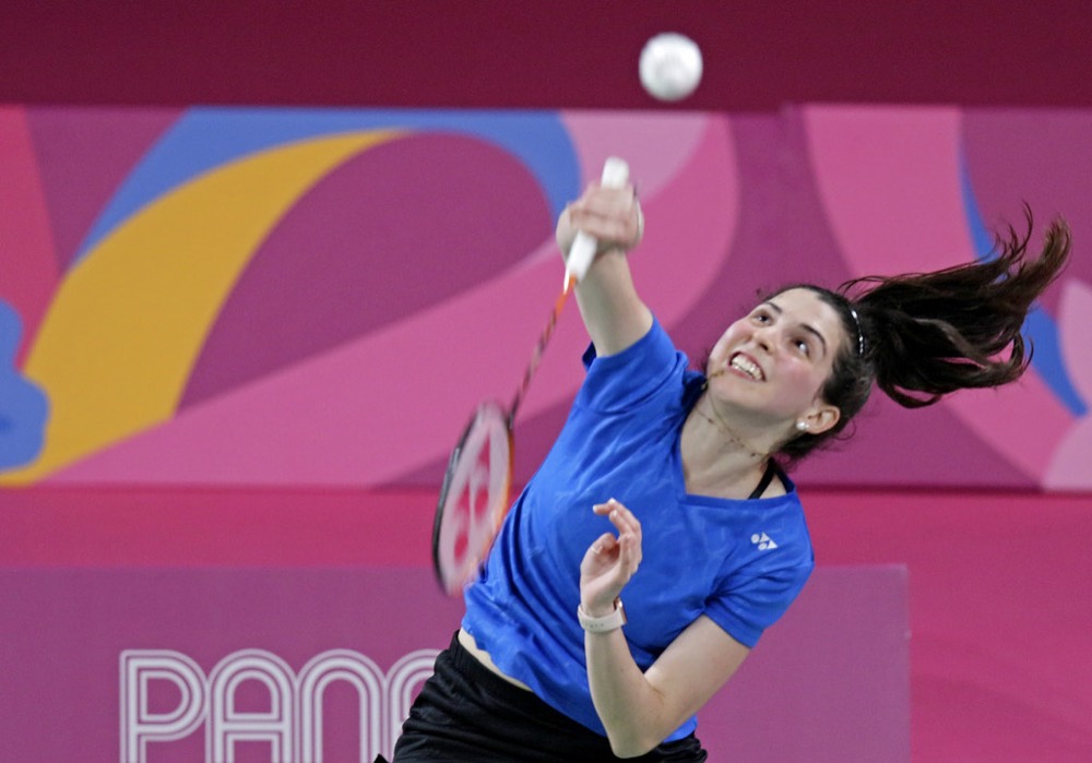 Player jumping to hit an overhead shot