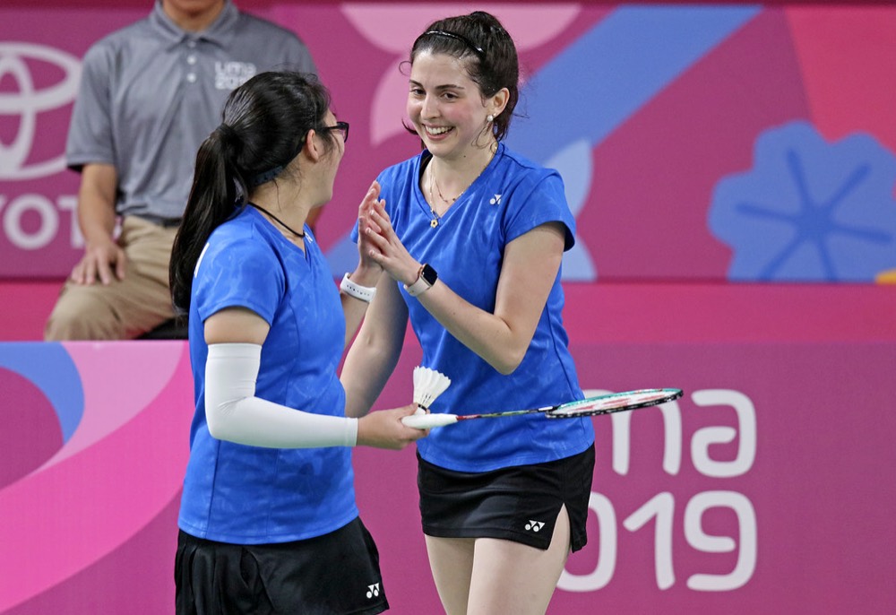 Doubles partners talking between points
