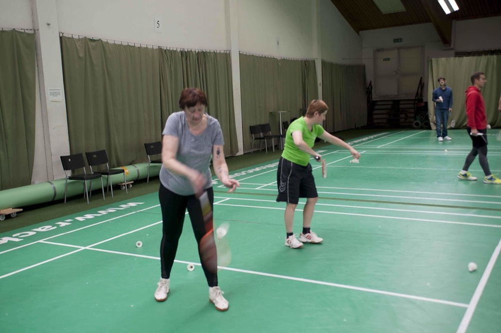 Recreational players enjoying a game in a sports hall