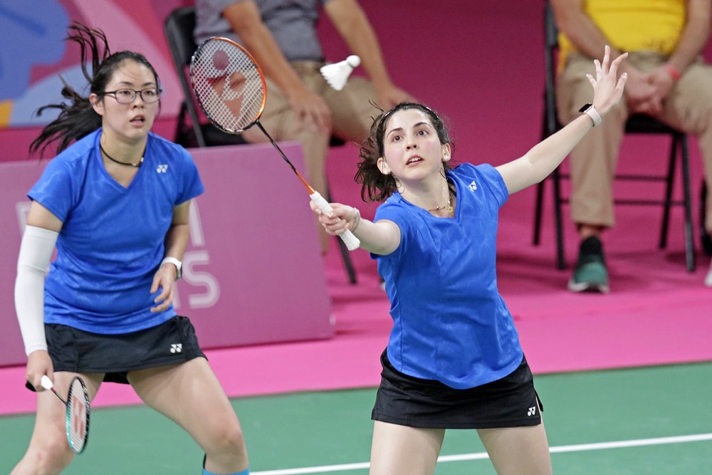 Player preparing an overhead shot at the net