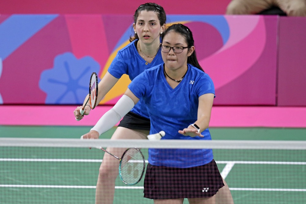 Doubles pair in front-and-back attacking positions