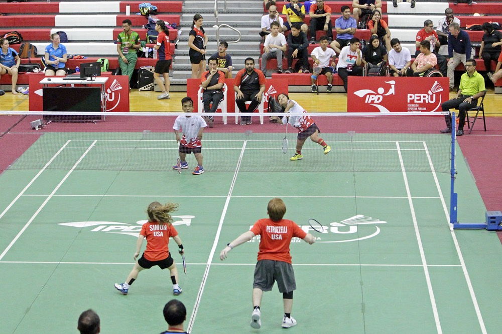 Children playing a badminton match