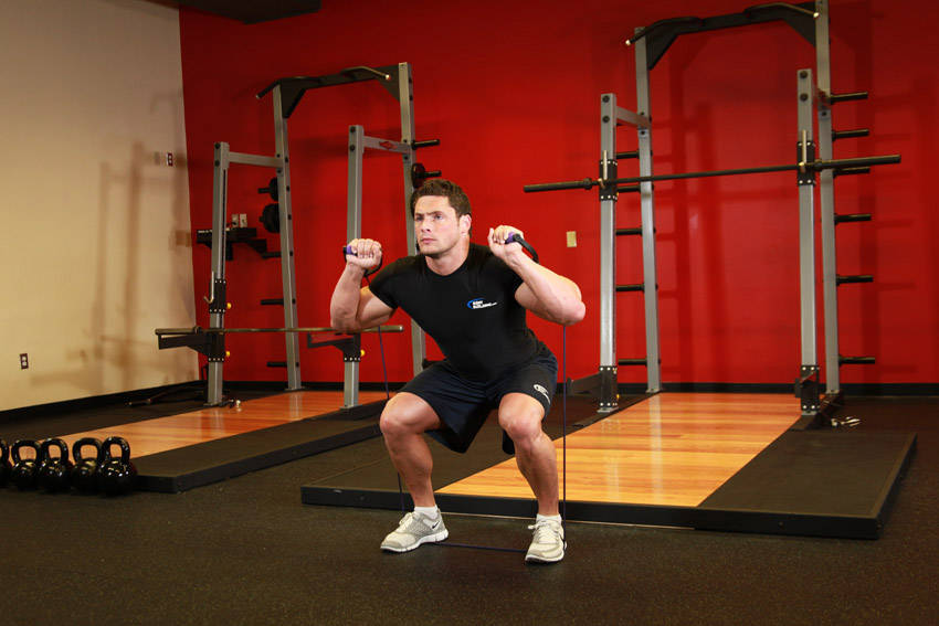 Resistance-band squat: end position